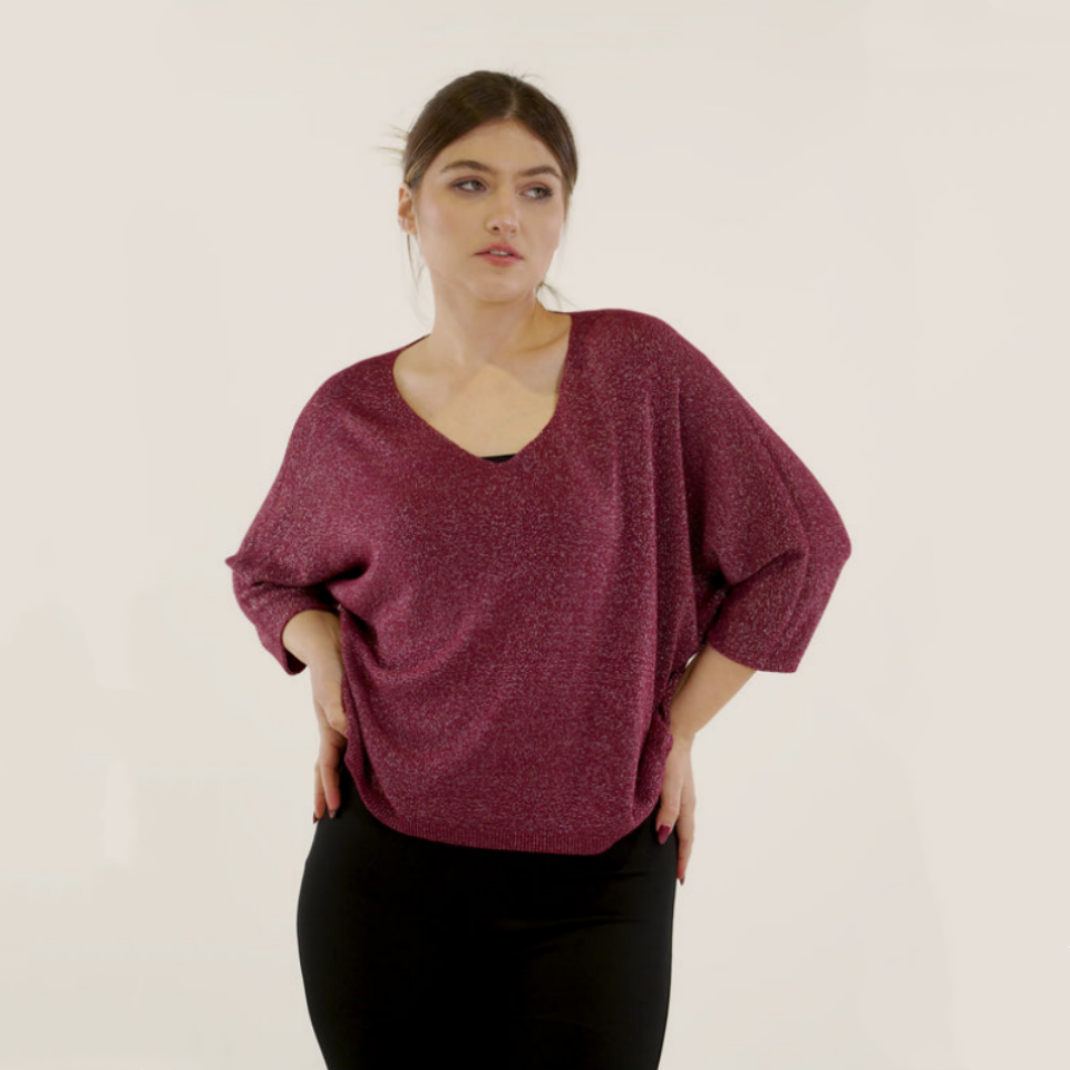 Vê-o Dailly｜Blusa com mangas morcego e lantejoulas.